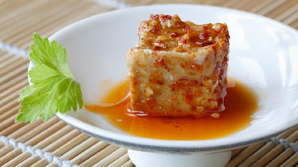 吃豆腐乳太多会呕吐吗胃疼(图1)
